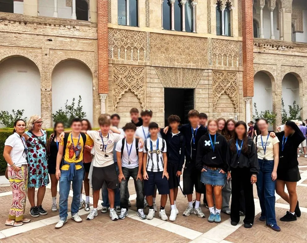 School group visiting the Royal Alcazar of Seville